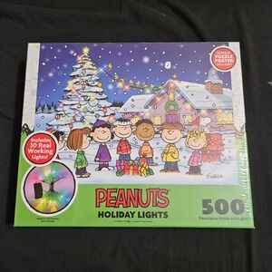 RoseArt Peanuts Holiday Lights 500 Piece Light Up Jigsaw Puzzle Snoopy Christmas